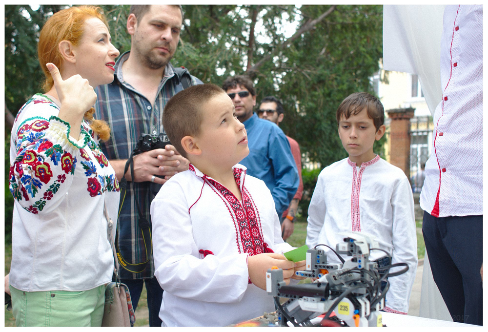 The younger generation learns to programming of a robot